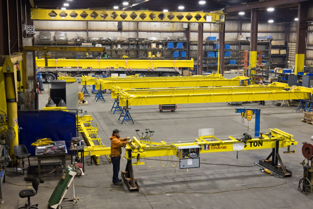 Industrial overhead crane in a modern facility